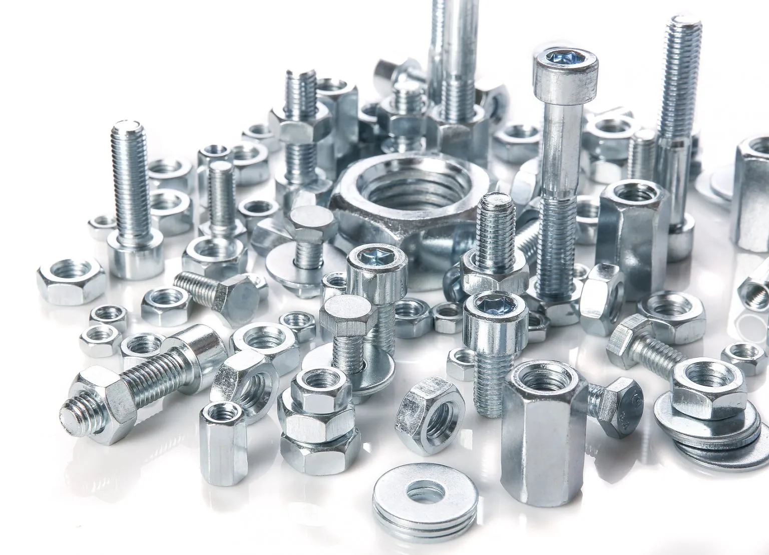 Various HEX BOLT fasteners on a white background.